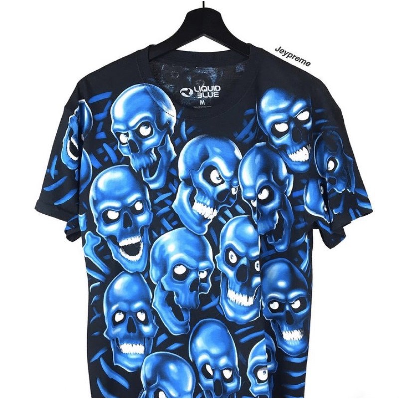 liquid-blue-skull-pile-blue-tee