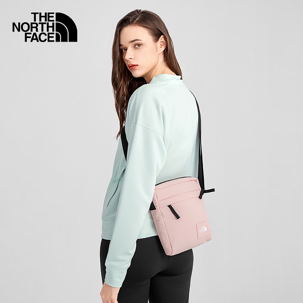 THE NORTH FACE CITY VOYAGER CROSS BODY EVENING SAND PINK/TNF BLACK