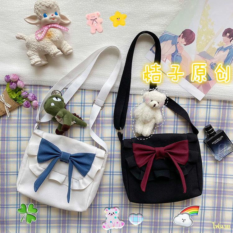 hot-sale-lolita-retro-sweet-bow-soft-girl-canvas-bag-korean-ins-girl-heart-messenger-bag-jk-bag-กระเป๋า
