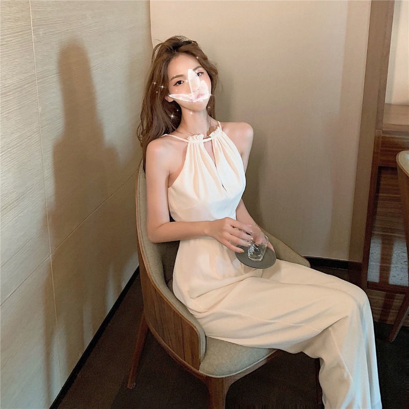 020523-hot-sale-ฤดูร้อน2022-jumpsuit-กลวงสีขาวชุดใหม่อารมณ์ที่ไม่มีสายหนังแขนกุดแขวนคอเสื้อหญิงเอวสูงกางเกงขากว้าง