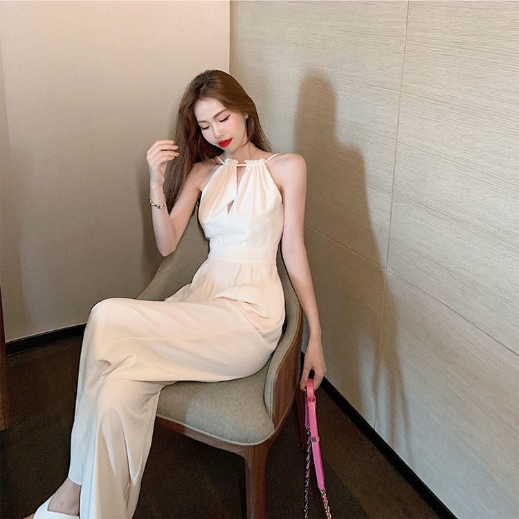 020523-hot-sale-ฤดูร้อน2022-jumpsuit-กลวงสีขาวชุดใหม่อารมณ์ที่ไม่มีสายหนังแขนกุดแขวนคอเสื้อหญิงเอวสูงกางเกงขากว้าง