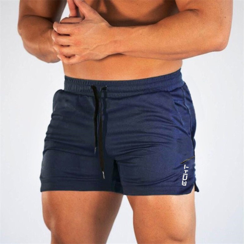 ภาพหน้าปกสินค้าพร้อมส่ง กางเกงวิ่ง กางเกงออกกำลังกาย กางเกงฟิตเนส กางเกงขาสั้นสำหรับผู้ชาย รุ่น T25