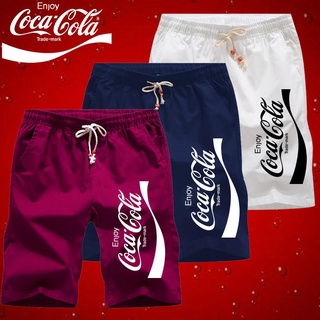 ภาพหน้าปกสินค้าแฟชั่นกางเกงขาสั้นกางเกงลําลองพิมพ์ลาย Coca Cola แบบแห้งเร็วสําหรับผู้ชาย ที่เกี่ยวข้อง