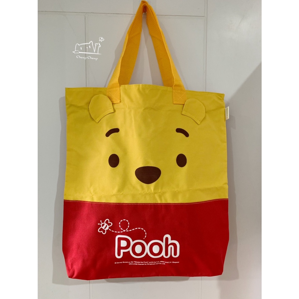 กระเป๋าสะพาย-กระเป๋าช๊อปปิ้ง-กระเป๋าลดโลกร้อน-ลายหมีพูห์-pooh-bear-shopping-bag-ของใหม่มือ-1-จาก-7-11