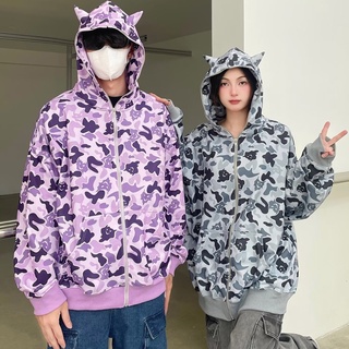 เสื้อคาร์ดิแกนกันหนาว มีฮู้ด พิมพ์ลายพราง ปีศาจน้อย สไตล์ฮิปฮอป สตรีท อเมริกัน ทรงหลวม เหมาะกับฤดูใบไม้ร่วง สําหรับผู้ชาย และผู้หญิง