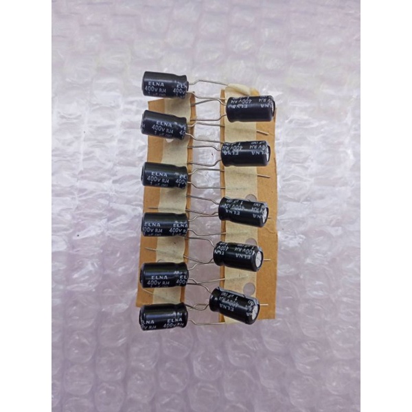 6ชิ้น-1uf-400v-elna-สีดำขนาด-10x5mm-สินค้าใหม่แกะกล่อง-capacitor-ตัวเก็บประจุ-1uf-400v-พร้อมส่ง