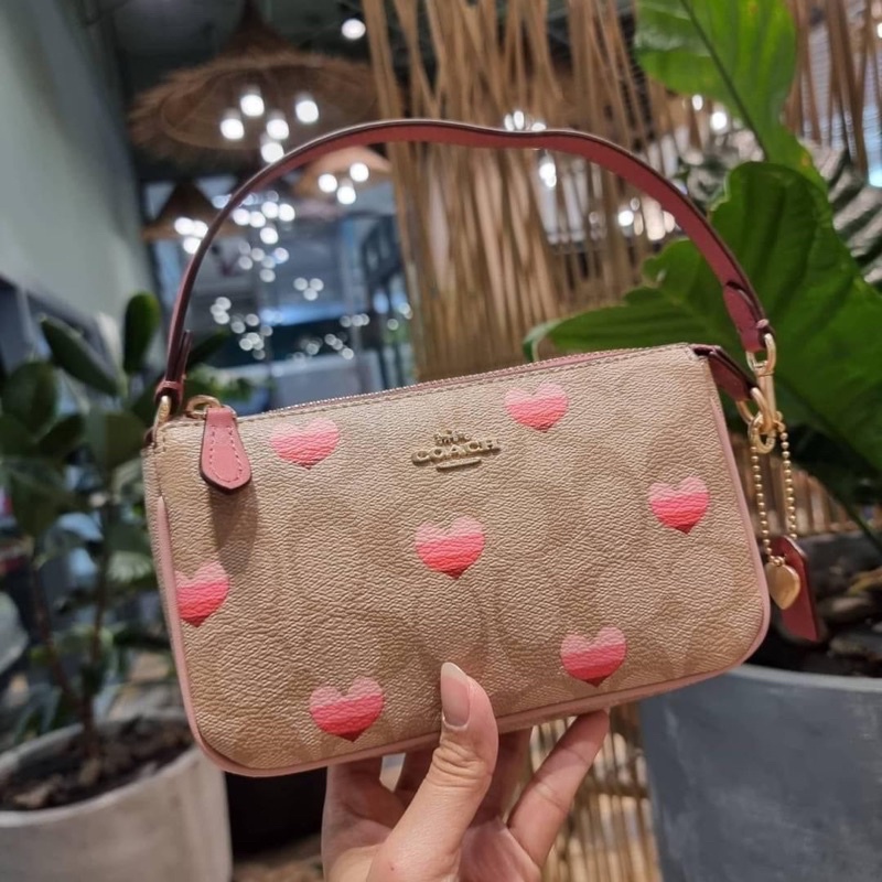 coach-ca796-nolita-19-in-signature-canvas-with-stripe-heart-print