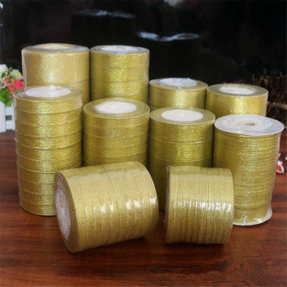 ริบบิ้นผ้าสีทอง-ริบบิ้นเนื้อทรายสีทอง-และสีเงิน-1ม้วน