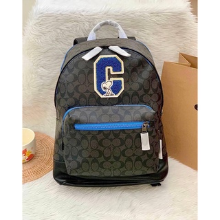 กระเป๋า Coach C5511 X Peanuts West Backpack In Signature Canvas With Varsity Patches