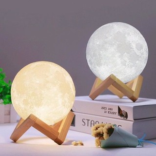 ภาพหน้าปกสินค้าโคมไฟ โคมไฟรูปทรงดวงจันทร์ 3 มิติ โคมไฟรูปดวงจันทร์ ขนาด:22ซม ปรับได้ 3 สี ที่เกี่ยวข้อง