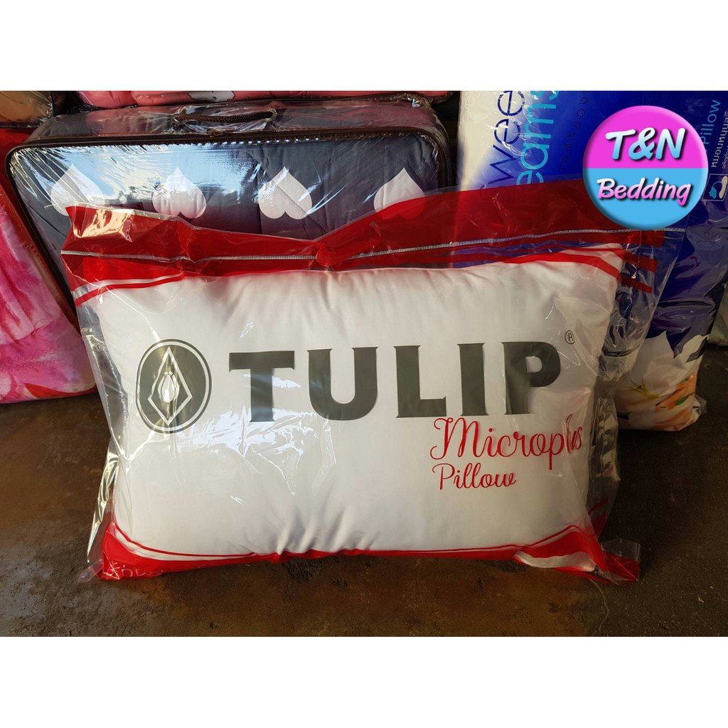 ภาพหน้าปกสินค้าNew Tulip Microplus หมอนหนุน ผ้าไมโครไฟเบอร์ นุ่ม ละมุน จากร้าน tongbedding บน Shopee