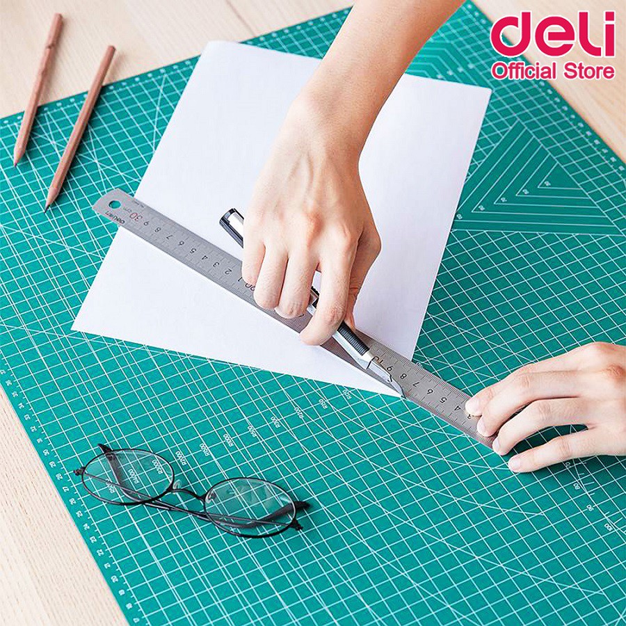 ภาพสินค้าDeli 78402 Cutting Mat PVC A2 แผ่นรองตัดกระดาษ สีเขียว แบบสองด้าน PVC ขนาด A2 (600 x 450mm) อุปกรณ์สำนักงาน แผ่นรองตัด จากร้าน deli_officialshop บน Shopee ภาพที่ 5