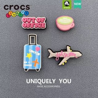 ภาพหน้าปกสินค้าjibbitz crocs charms ชุดท่องเที่ยว ตัวติดรองเท้า ตัวติดรองเท้า crocs เซ็ต 4 ชิ้น ที่เกี่ยวข้อง