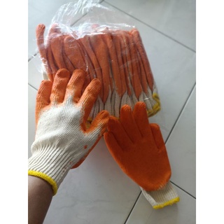 สินค้า ถุงมือเคลือบยางสีส้มราคา ต่อโหลมี 12 คู่