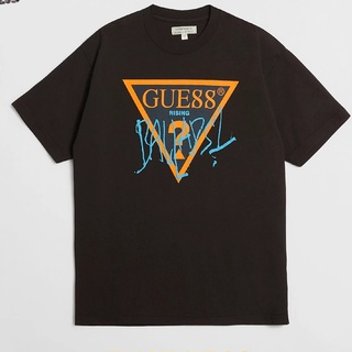 🌟พร้อมส่ง🌟Guess เสื้อยืดแขนสั้นผ้าฝ้ายระบายอากาศพิมพ์ลายโลโก้สําหรับผู้ชายและผู้หญิง