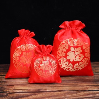 ภาพหน้าปกสินค้า(ราคาส่ง) ถุงผ้าแพรสีแดง ถุงใส่ส้ม ถุงตรุษจีน ถุงมงคล เหมาะสำหรับใส่ของขวัญ เครื่องประดับ ส้ม เทศกาลตรุษจีน ถุงใส่ส้มจีน ที่เกี่ยวข้อง