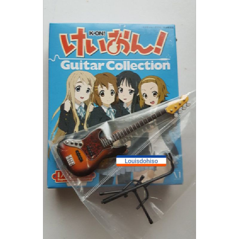 1/12 scaleMio model [Jazz Bass Type] with a guitar stand Mio guitar