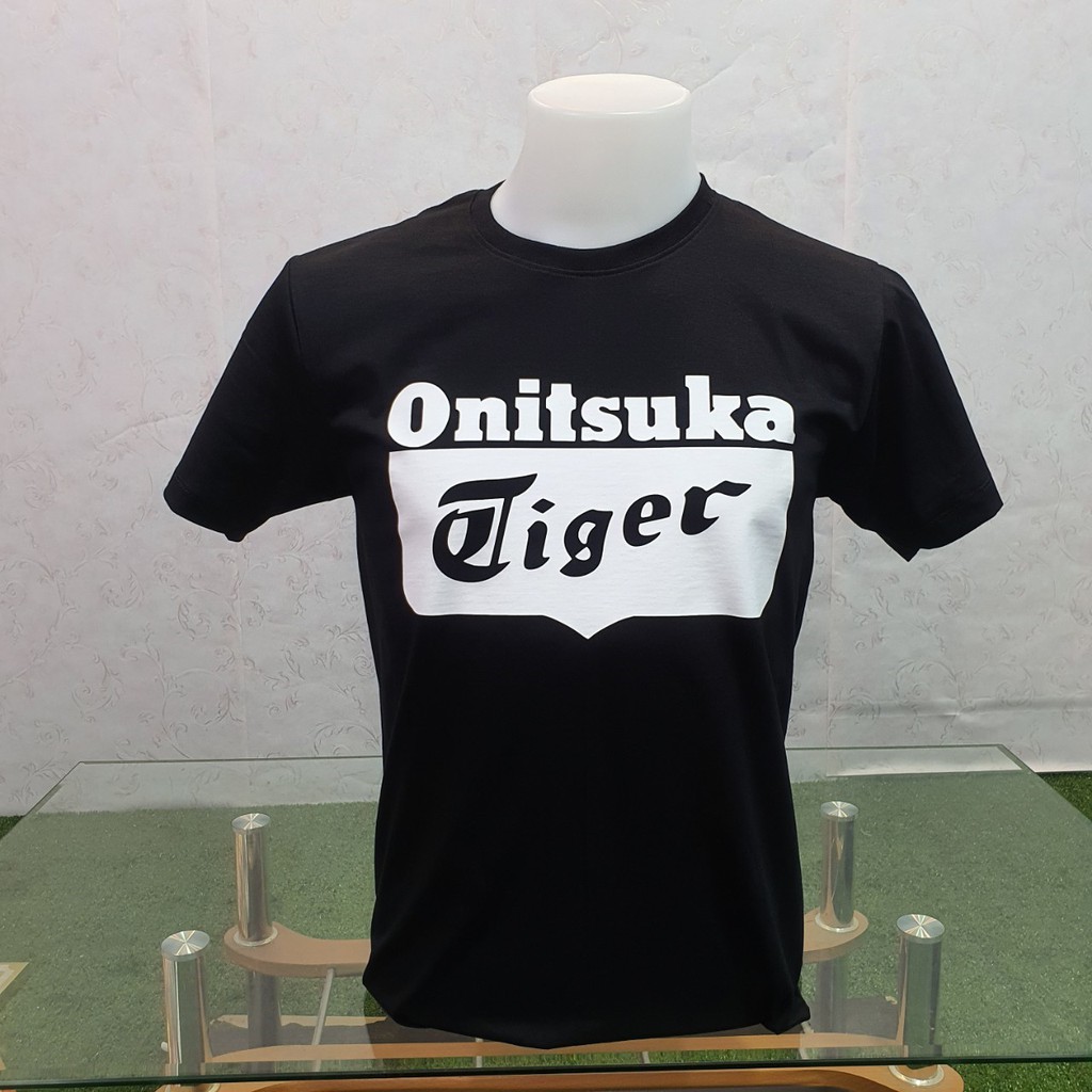 ภาพหน้าปกสินค้าเสื้อ Onitsuka (งานดี ) ราคาเริ่ม 150 บาท (ผ้าดี cotton100, สกรีนแบบเฟล็ก PU)