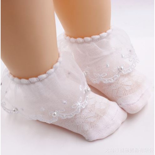 ภาพหน้าปกสินค้าF3X0 ถุงเท้าเด็ก มีระบาย ประดับมุก (ชมพู/ขาว) ไม่มีกันลื่น จากร้าน shoppingdekdee บน Shopee