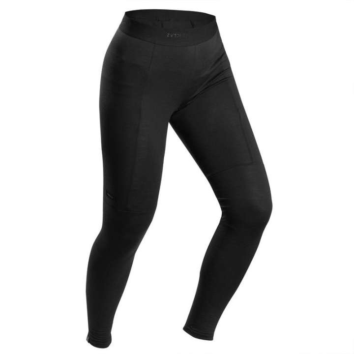 กางเกงเลกกิ้งผู้หญิงผ้าเมอริโนวูลสำหรับใส่เทรคกิ้งบนภูเขารุ่น-trek-500-สีดำ