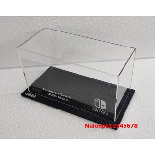 สินค้า NintendoSwitch OLED กล่องอครีลิคใสครอบกันฝุ่นรูหลัง ฐานสีดำ
