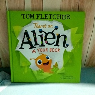 หนังสือปกแข็ง Theres an Alien in your book มือสอง