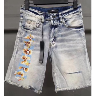 ภาพหน้าปกสินค้าNewest 22SS AMIRI Denim Shorts Light Blue Ripped Splash-Ink Slim Jeans Shorts Men\'s and Women\'s High Street Summer ที่เกี่ยวข้อง