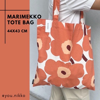 ภาพหน้าปกสินค้า[โค้ด NBETH2  ลด10% สูงสุด 300.-] พร้อมส่ง กระเป๋า Marimekko tote bag ดอกสีพีช ใหม่ล่าสุด ของแท้ 100% ซึ่งคุณอาจชอบสินค้านี้