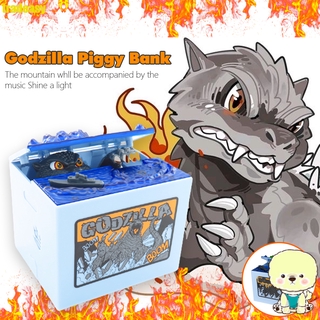 ภาพหน้าปกสินค้าTD Godzilla กระปุกออมสินอิเล็กทรอนิกส์พร้อมเหรียญเสียงเบากล่องเก็บเหรียญอัตโนมัติของขวัญกล่อง ที่เกี่ยวข้อง