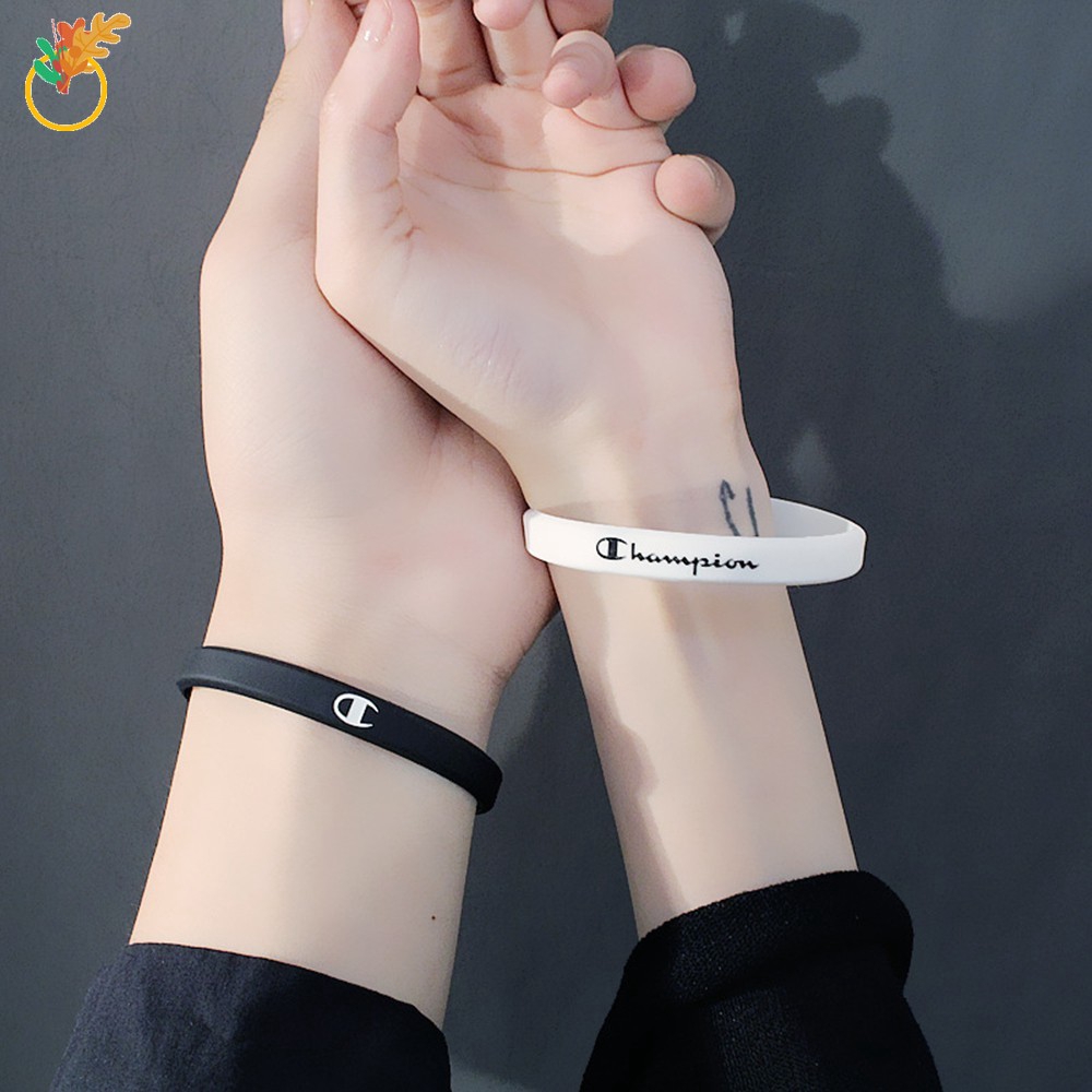 ราคาและรีวิวFashion Brand Sports Silicone Bracelet Couple Basketball Run Black White Color