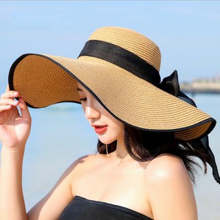 ภาพขนาดย่อของสินค้าหมวกสานผู้หญิง  หมวกปีกกว้าง หมวกเที่ยวทะเล ขอบสีดำ โบว์สีดำ มี สีขาว ครีม น้ำตาล