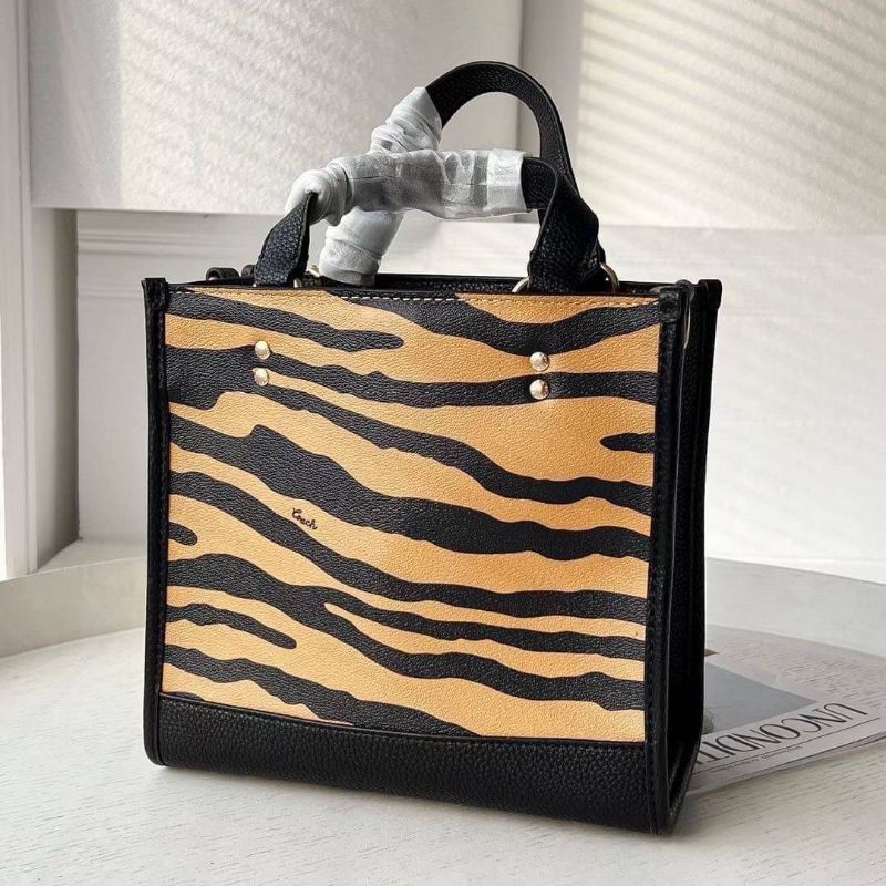coach-dempsey-tote-22-with-tiger-print