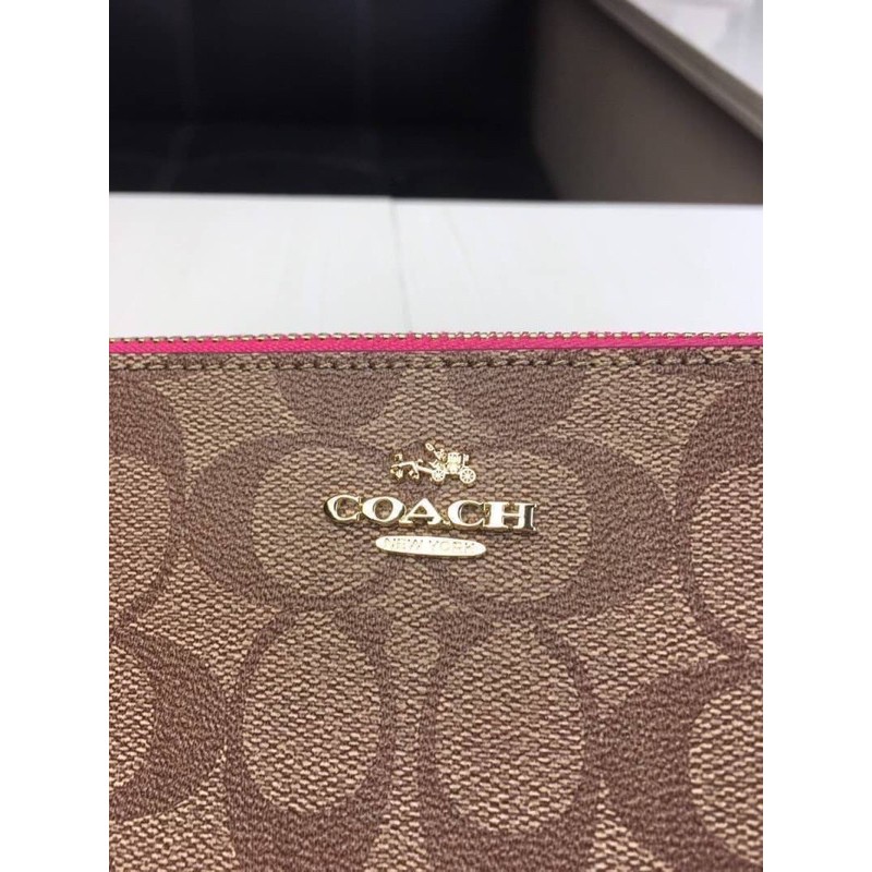 coach-messico-top-handle-pouch-in-signature-coated-canvas