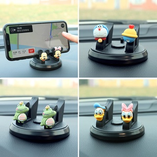 ภาพหน้าปกสินค้าMobile phone car bracket car center console suction cup car fixed navigation support bracket cute support bracket ที่เกี่ยวข้อง