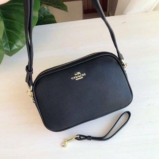 Coach crossbody clutch In Pebble Leather