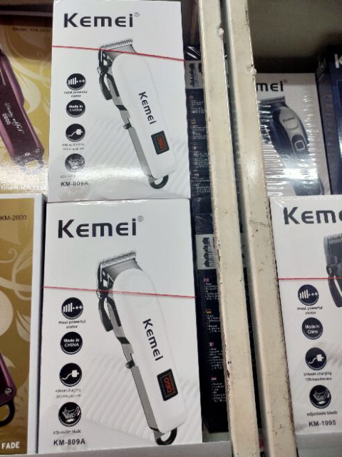 kemei-km-809a-ปัตตาเลี่ยน-ใบมีดสแตนเลส-ปรับระดับได้-หวีรองตัด-4-ขนาด