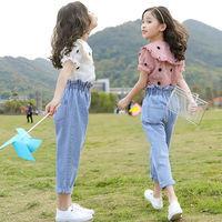 ภาพหน้าปกสินค้า🔥Hot sale！ สาว ๆ ในช่วงฤดูร้อนในช่วงฤดูร้อนปี 2020 เด็กใหม่เวอร์ชั่นเกาหลีของลำลองสองชิ้นชุดเด็กผู้หญิงต่างประเทศแขนสั้ ที่เกี่ยวข้อง