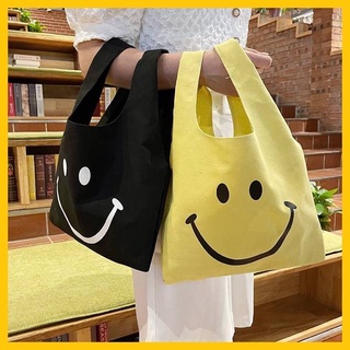 smiley bag 😄 พร้อมส่ง รวม กระเป๋าผ้าถุงหิ้วสมายลี่  กระเป๋าผ้าสีเหลือง กระเป๋าผ้าสีดำ กระเป๋าผ้าสีครีม