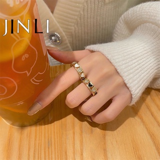 ภาพหน้าปกสินค้าJinli แหวนนิ้วมือโลหะผสมประดับเพชร Rhinestone รูปหัวใจสีทองสําหรับสตรี ที่เกี่ยวข้อง