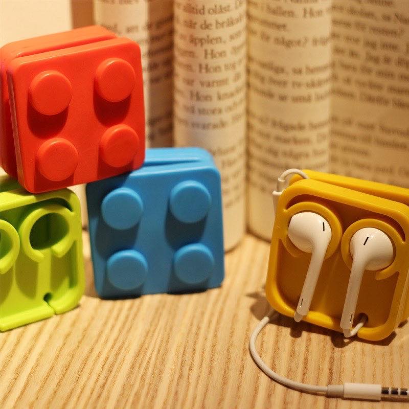 ภาพหน้าปกสินค้าที่เก็บสายหูฟัง Golette Earphone Holder รุ่น Lego จากร้าน ipowergo บน Shopee