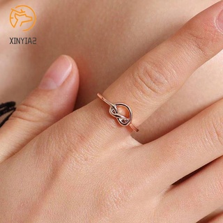 ภาพหน้าปกสินค้าแหวนความรักแฟชั่นที่เรียบง่าย ของหญิงสาวสแตนเลสแหวนผูกปมหัวใจแหวนไทเทเนียม ซึ่งคุณอาจชอบราคาและรีวิวของสินค้านี้