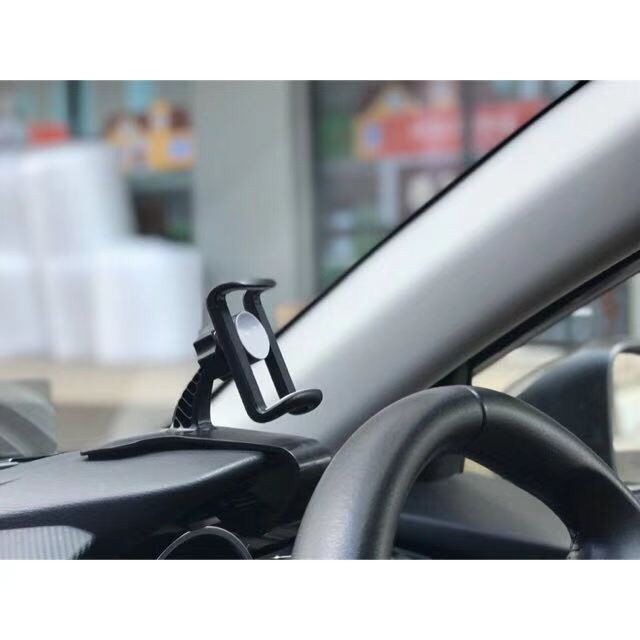 ภาพหน้าปกสินค้าที่วางโทรศัพท์ในรถ Smartphone Car Holder ที่ยึดมือถือในรถ แท่นวางโทรศัพท์ แบบหนีบ001