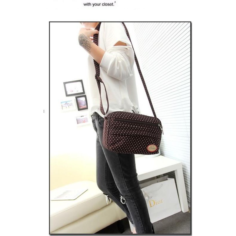 ภาพหน้าปกสินค้าFashion handbag กระเป๋าสะพายผ้าใบ สำหรับผู้หญิง มีหลายช่องT-791 จากร้าน happy12shop บน Shopee