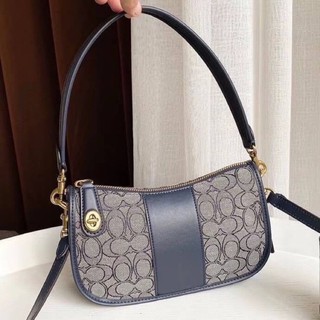 Coach SWINGER BAG IN SIGNATURE