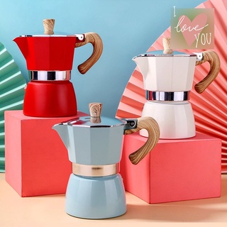 ภาพหน้าปกสินค้าMoka Pot กาต้มกาแฟสดพกพา หม้อต้มกาแฟ ทรงแปดเหลี่ยม หูจับลายไม้ ที่เกี่ยวข้อง