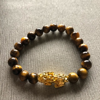 กำไลหิน Golden Tigers eye พร้อมจี้ปี่เซยะสีทอง