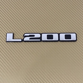 โลโก้  L 200 ติดรถ มิตชูบิชิ สีเงินขอบดำ ขนาด* 2.3 x 17 cm