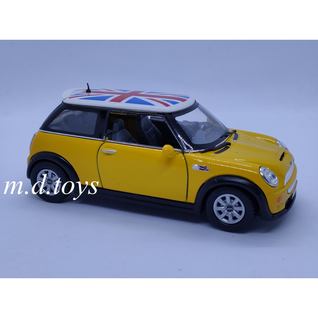 ภาพหน้าปกสินค้ารถโมเดลเหล็ก Mini Cooper S w flag printing จากร้าน m.d.toys บน Shopee
