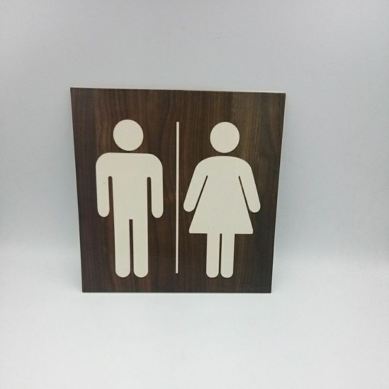 ป้ายห้องน้ำรวมชายและหญิงลายไม้