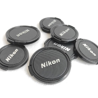 ภาพขนาดย่อของสินค้าฝาครอบเลนส์ ปิดหน้าเลนส์ ยี่ห้อ Nikon ขนาด52mm 58mm 62mm 72mm 77mmแท้ จากญี่ปุ่น